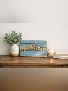 small blue and gold wooden gather sign decor